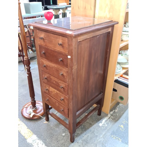 381 - Star Lot : A solid well made vintage tall boy unit featuring six pull out drawers, turned handles an... 