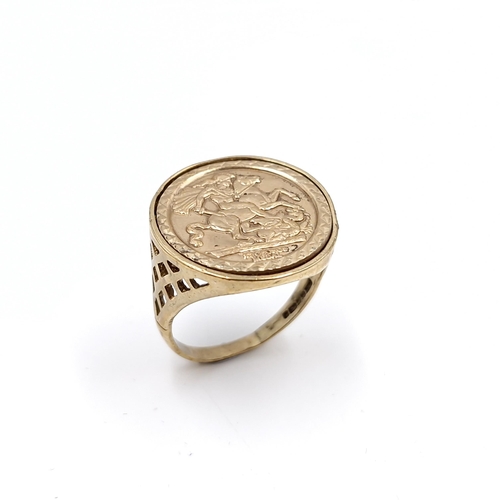 10 - Star Lot : A nine carat gold gents St. George medallion ring set with lattice cut mount. Ring size -... 