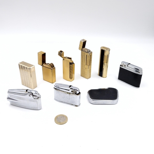 29 - A collection of nine assorted lighters - some Ronson. Items as per photographed. Total weight - 594 ... 