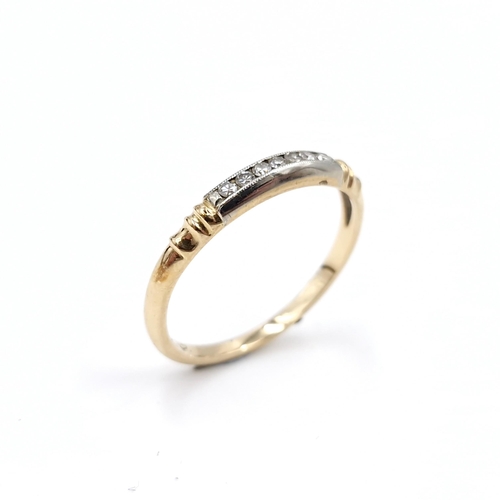 32 - Star Lot : A very pretty 18 carat gold diamond half eternity ring. Weight - 1.57 grams. Ring size - ... 