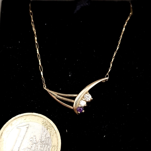 401 - A very pretty nine carat gold gem set pendant necklace. Length - 49 cms. Weight - 1.55 grams. Boxed.