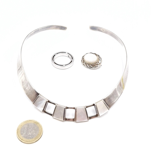 407 - A sterling silver mother of pearl choker together with a gem set ring. Size - O. Also, a mother of p... 