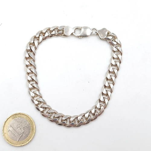 413 - A sterling silver twist link bracelet set with lobster clasp. Weight - 33.15 grams.