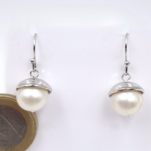 422 - A pair of large fresh water pearl earrings by Jasper Conran - suitable for pierced ears. Comes in or... 