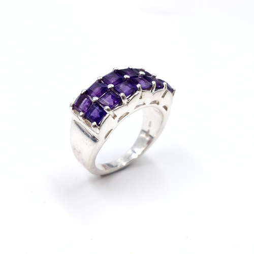 426 - A super sterling silver 12 stone twin channel set amethyst stone ring with TGGC (The Genuine Gemston... 