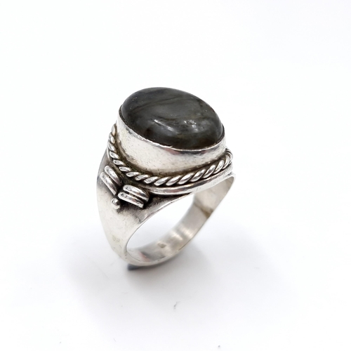 429 - A good example of a gents  Victorian cabochon jadeite stone silver ring with rope and scroll mount. ... 