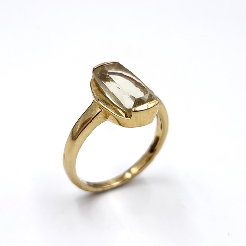 440 - A sterling silver  gilt ring with facet cut citrine stone. Ring size - V. Weight - 3.83 grams. Boxed... 