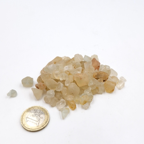 442 - A collection of rough yellow cut stone sapphires. Weight - 538.85 carats.