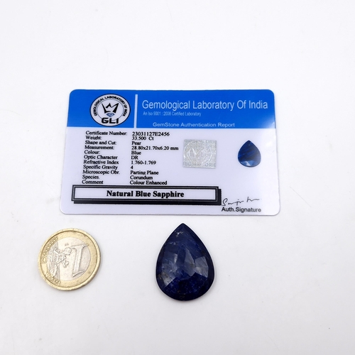 459 - A very fine example of a facet cut blue sapphire stone of 33.5 carats. Comes with certificate of aut... 