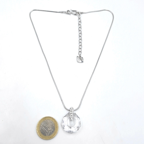 465 - A brand new Swarovski crystal pendant & chain. Length - 48 cms,. Weight - 12.4 grams. Comes in origi... 