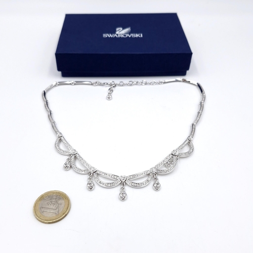 468 - A brand new  very pretty Swarovski swag designed gem set necklace. Length - 44 cms. Weight - 24 gram... 