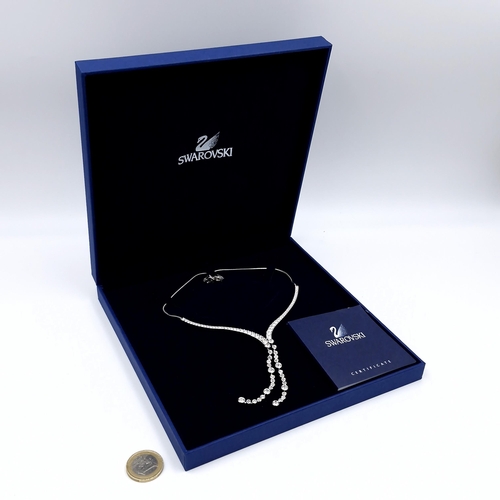 473 - A brand new  nice example of a Swarovski gem set drop pendant choker. Length - 42 cms. Weight - 20 g... 