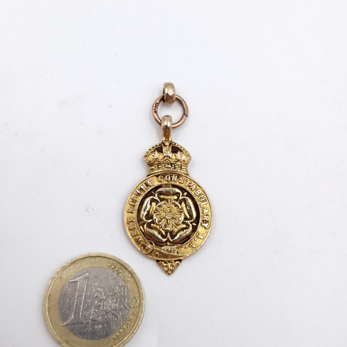 50 - Star Lot : A nice quality nine carat gold pendant medallion for West Riding Constabulary  with inscr... 