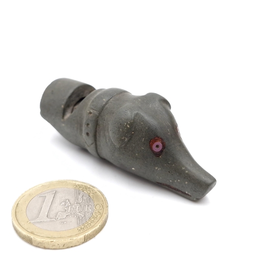 52 - A very unusual vintage whistle in the form of a dogs head. Dimensions - 6 cms. Weight - 25.59 grams.... 