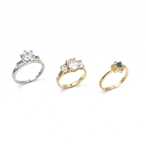 9 - A collection of three gem set dress rings. Sizes: P, S x 2. Total weight - 9 grams.