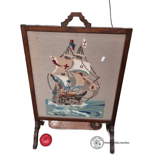 645 - Victorian mahogany fire screen with hand-embroidered ship motif, featuring intricate wool needlepoin... 