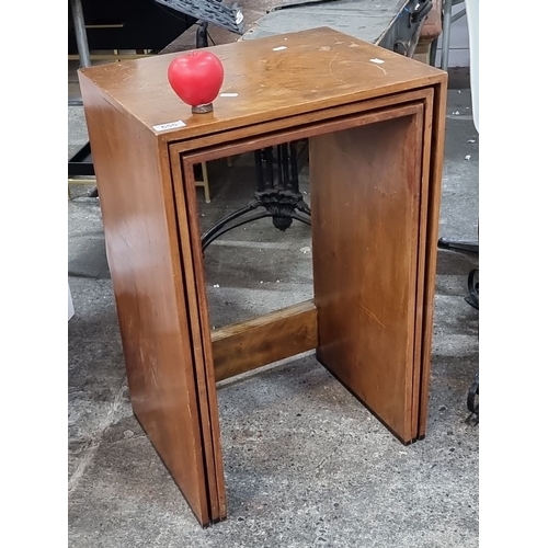 655 - Mid-Century Modern nesting tables in solid wood, set of three. Simple, streamlined design.