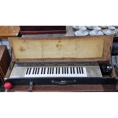 657 - Star Lot : Vintage Yamaha PSS-570 keyboard with original hard carrying case, includes power cord. Ea... 