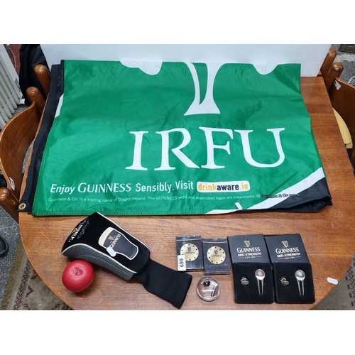 669 - Mixed lot of Guinness and IRFU memorabilia, including an IRFU flag, Guinness-branded golf club cover... 