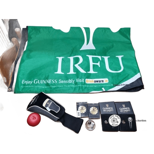 669 - Mixed lot of Guinness and IRFU memorabilia, including an IRFU flag, Guinness-branded golf club cover... 