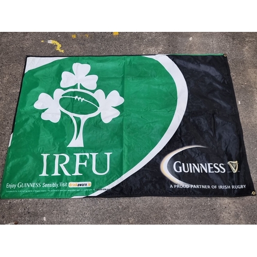 669 - Mixed lot of Guinness and IRFU memorabilia, including an IRFU flag, Guinness-branded golf club cover... 