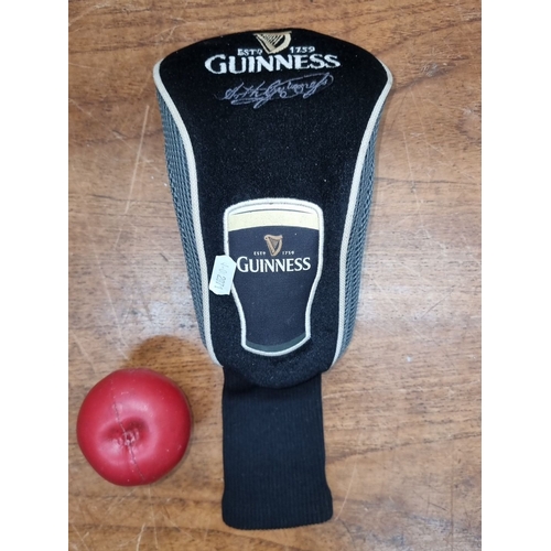 669 - Mixed lot of Guinness and IRFU memorabilia, including an IRFU flag, Guinness-branded golf club cover... 