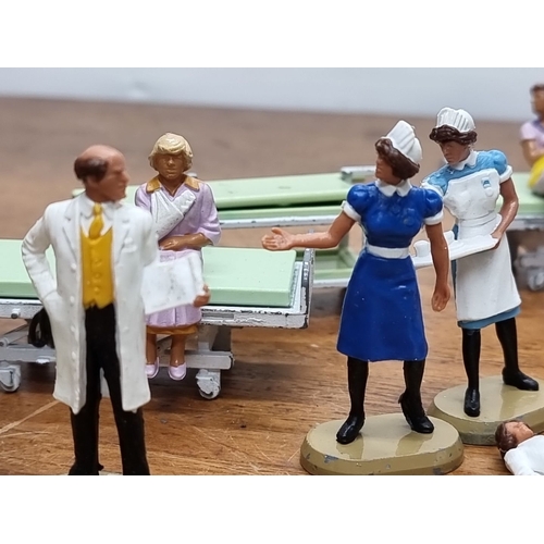 680 - Vintage Britains Hospital Play Set, 1983, includes assorted medical figures, beds, and equipment. Ma... 