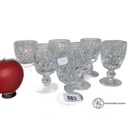 683 - Set of eight Waterford crystal glasses with classic diamond-cut design.