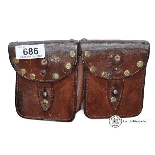 686 - Antique leather double pouch with brass rivet details and dual belt loops. From the early 20th centu... 