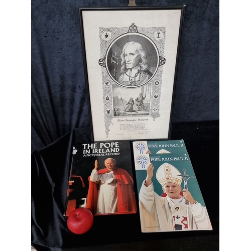 691 - Framed portrait and text of Oliver Plunkett in Irish, accompanied by three publications on Pope John... 