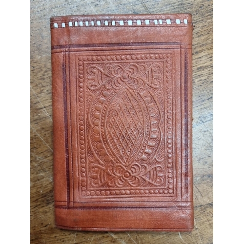 693 - Mixed lot comprising seven items: three leather wallets, one embossed leather notebook, one purple l... 