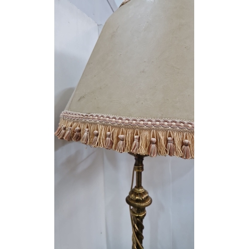 895 - Victorian brass floor lamp with marble-topped side table and detailed fringed shade. Features a twis... 