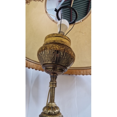 895 - Victorian brass floor lamp with marble-topped side table and detailed fringed shade. Features a twis... 