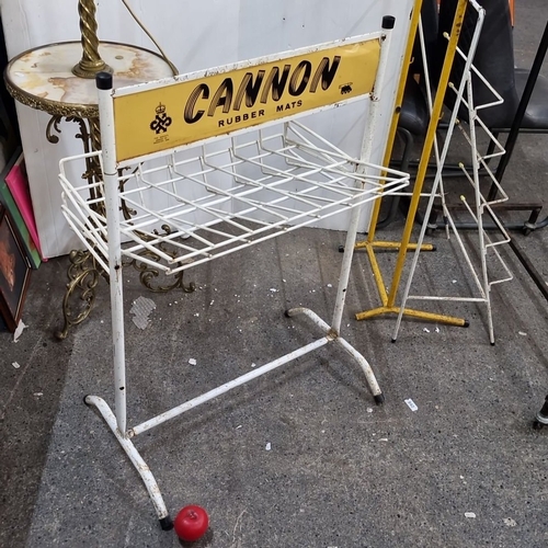 896 - Vintage Cannon Rubber Mats Display Stand, made of metal, includes original yellow advertisement sign... 