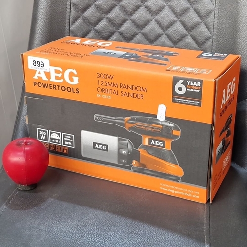 899 - A new in box AEG 300W 125mm Random Orbital Sander, Model EX 125 ES, 6-Year Product Warranty.