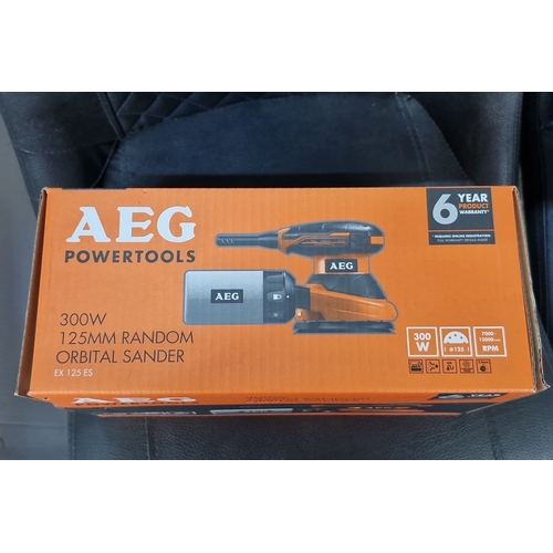 900 - A New in box AEG 300W 125mm Random Orbital Sander, model EX 125 ES, features a 6-year product warran... 