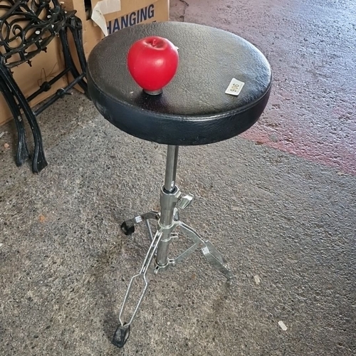 906 - Adjustable black leather drum  stool with chrome tripod base.