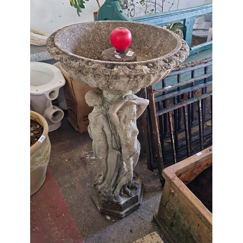 919 - Star lot :A concrete birdbath with cherub and maiden figures supporting an ornate basin. Intricate d... 