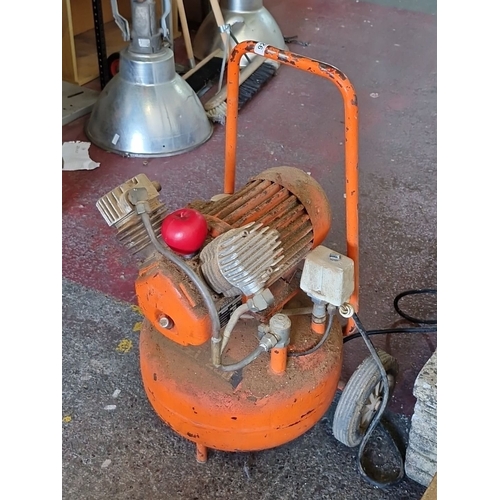 922 - A german made Bodge stolizi  orange portable air compressor with attached power unit.