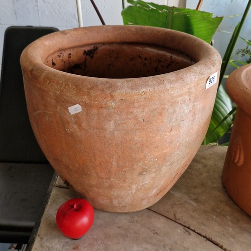 926 - A large Terracotta planter with natural patina.