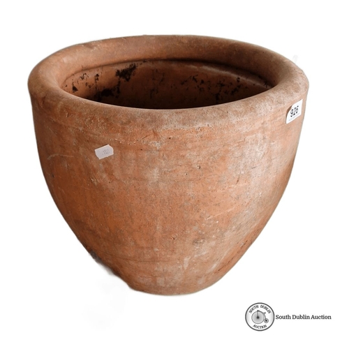 926 - A large Terracotta planter with natural patina.