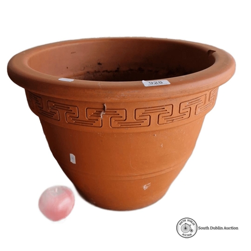 928 - A large Terracotta plant pot with Greek-key motif along the rim. It has a smooth, wide lip and a cla... 