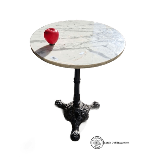 934 - Star lot : A Marble-topped table with ornate cast iron pedestal base.A good quality lot.