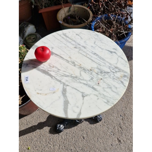 934 - Star lot : A Marble-topped table with ornate cast iron pedestal base.A good quality lot.