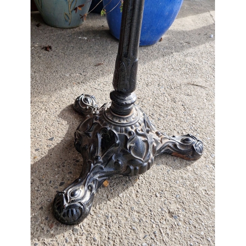 934 - Star lot : A Marble-topped table with ornate cast iron pedestal base.A good quality lot.