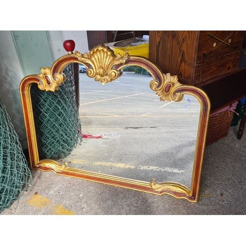 937 - Star lot: A Baroque-style ornate mirror with gold gilded frame, featuring intricate shell and scroll... 