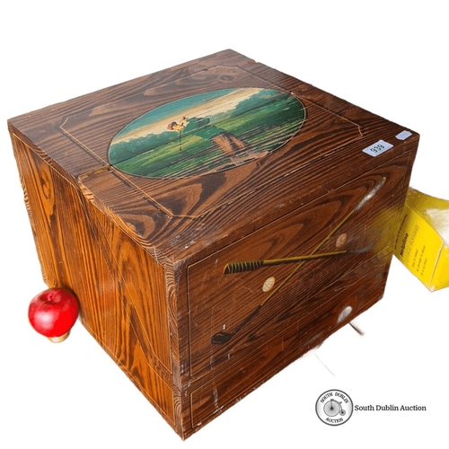 939 - A vintage Wooden storage box with hinged lid, featuring a painted golf scene and crossed clubs. Inte... 