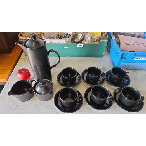 951 - Wedgwood black basalt tea service, comprising 6 cups with saucers, teapot, creamer, and sugar bowl. ... 