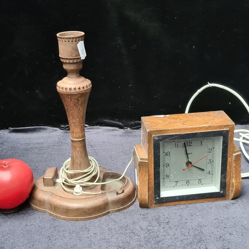 214 - An Art Deco Goblin clock along with a Bakelite desk clamp. Unchecked.