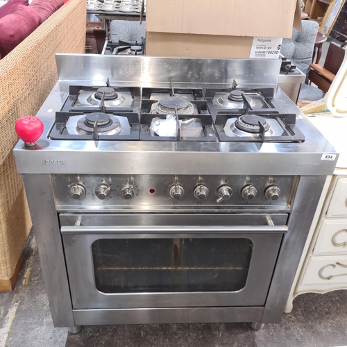 494 - Star Lot : An industrial Stainless Steel kitchen restaurant Bosch five ring gas range with single ov... 